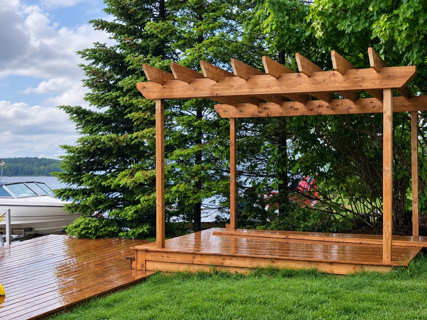 Custom wood pergola constructed beside the lake